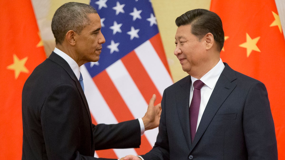 President Barack Obama and Chinese President Xi Jinping shake hands following the conclusion of their joint news conference at the Great Hall of the People in Beijing