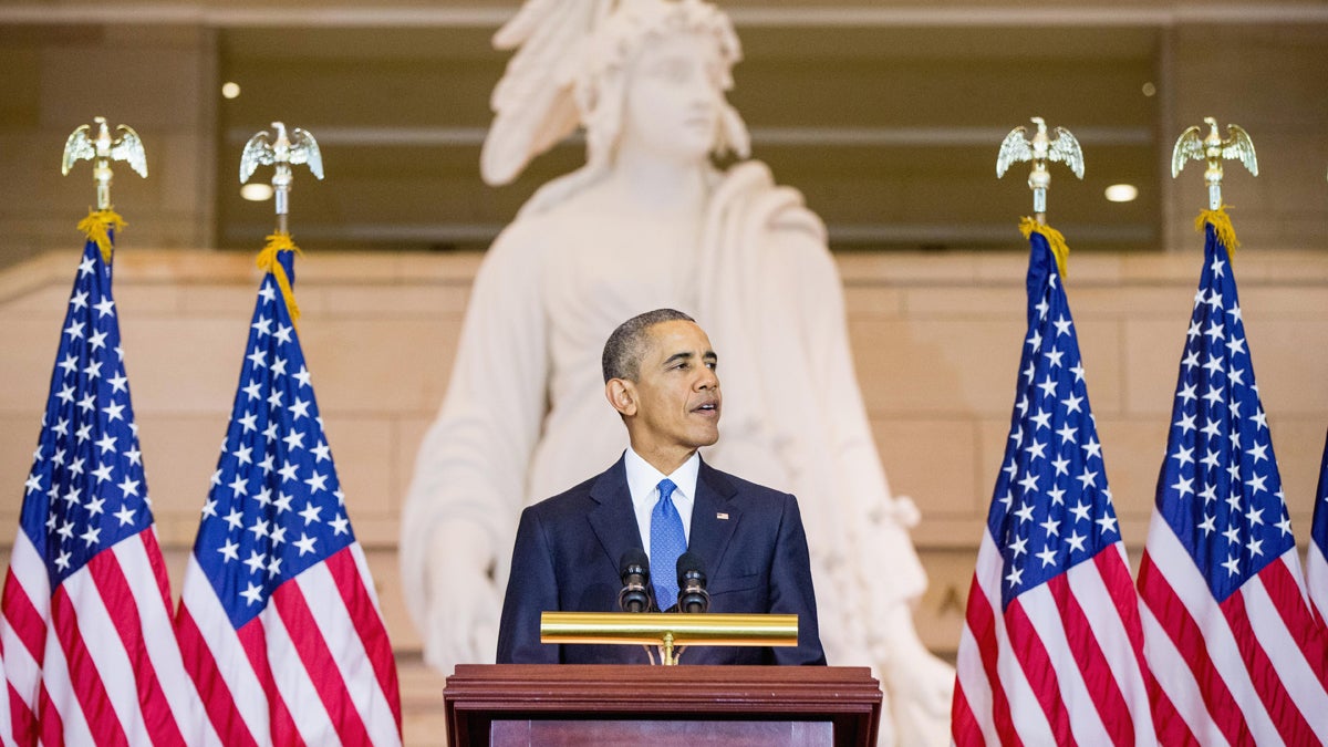  President Barack Obama speaks in Emancipation Hall on Capitol Hill in Washington, Wednesday, Dec. 9, 2015,  during a commemoration ceremony for the 150th anniversary of the ratification of the 13th Amendment to the U.S. Constitution which abolished slavery in the U.S. (AP Photo/Andrew Harnik) 