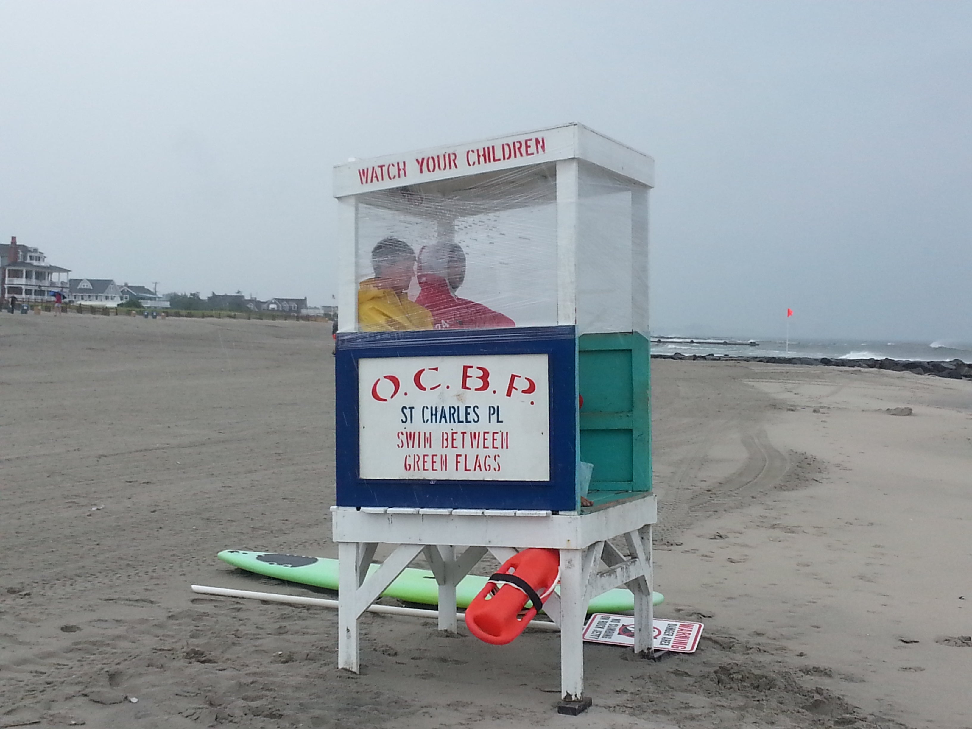  Ocean City lifeguards use plastic to protect themselves from storm (Tom MacDonald/WHYY) 
