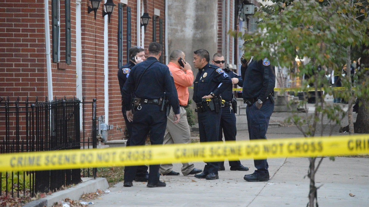  Officers gather in the 600 block of N. Jefferson St. in Wilmington after a Wilmington Police officer was injured in a pursuit. (John Jankowski/for NewsWorks) 