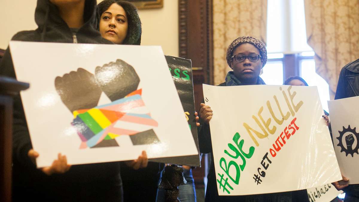 Activists representing Philly Black Lives Matter, the Black and Brown Workers Collective, and the Coaliton for REAL Justice made statements on the alleged racism in Philadelphia's Gayborhood. (Brad Larrison for NewsWorks)