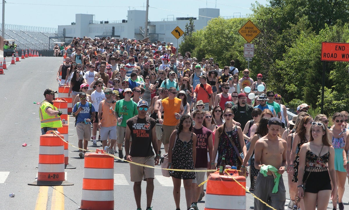  Festival goers arrive on Day 2 of the 2014 Firefly Music Festival at The Woodlands in Dover, Del. (Photo by Owen Sweeney/Invision/AP) 