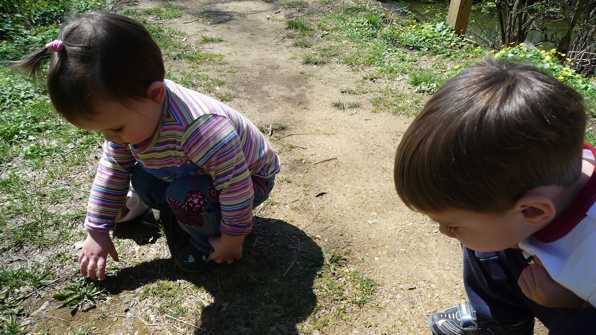  Jen Bradley's daughter and son searching for signs of spring. (Courtesy of Jen Bradley) 