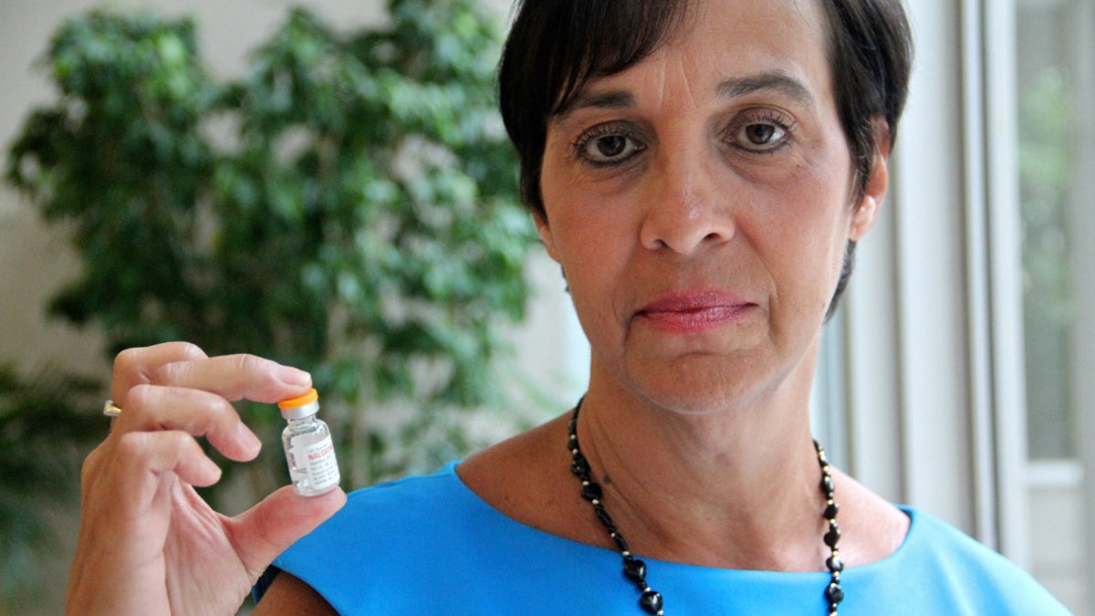  Patty DiRenzo now carries a vial of naloxone, a medication that can halt a heroin overdose, with her at all times. She believes it could have saved her son, who overdosed in 2010. She wants to know why more doctors in New Jersey aren't prescribing it. (Emma Lee/WHYY) 