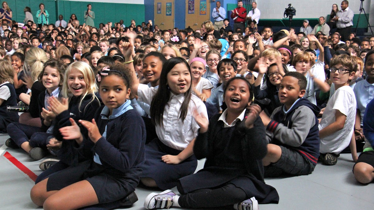 Penn Alexander students celebrate after learning their school was named a National Blue Ribbon School of Excellence. (Emma Lee/WHYY)