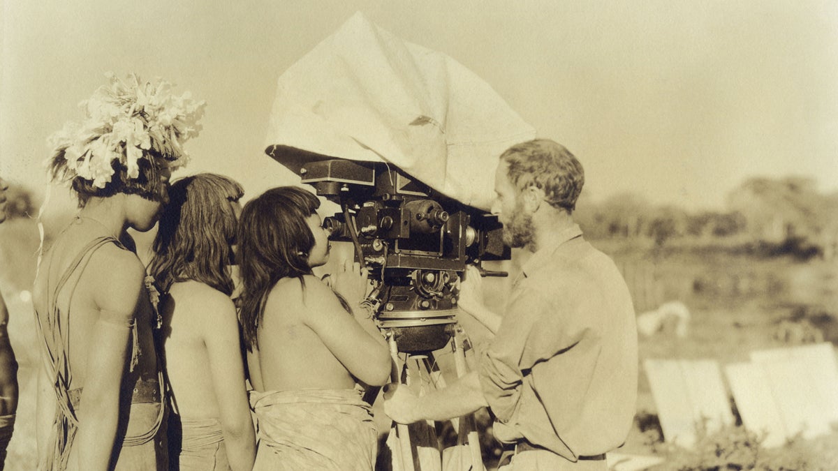  Academy Award-winning cinematographer Floyd Crosby, father of musician David Crosby, shows the expedition’s experimental sound/film camera to the Bororo while filming 