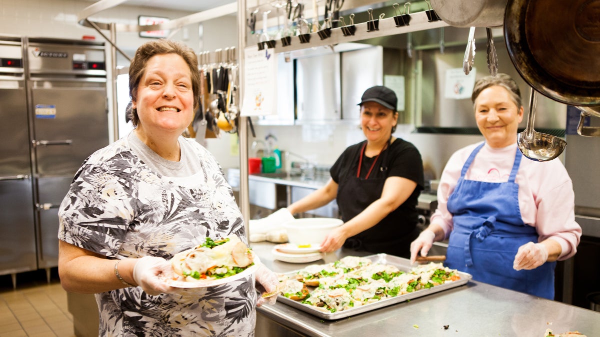 Clients of the Wellspring Clubhouse work in the cafe and run the day-to-day administration as a part vocational rehabilitation programming. (Image courtesy of the Penn Foundation and Wellspring Clubhouse) 