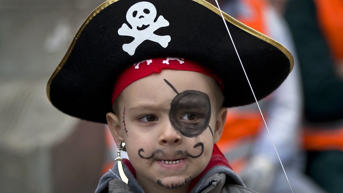  A boy wears a pirate's costume after a Halloween party. (AP Photo/Vadim Ghirda, file) 