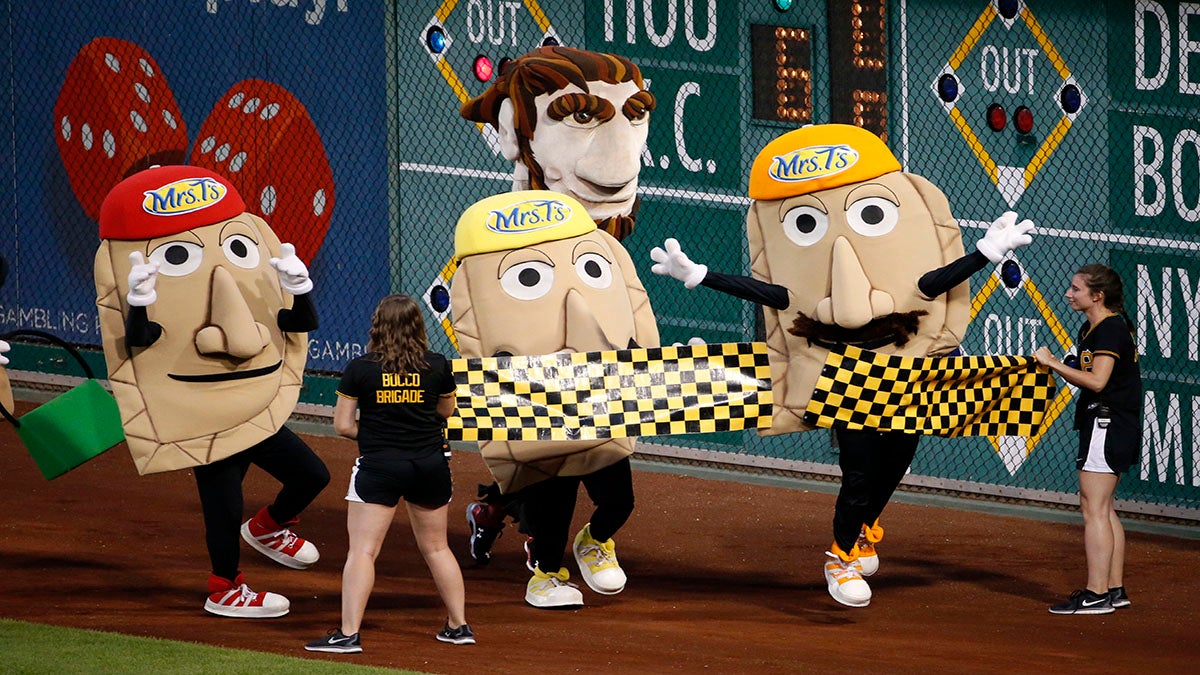  The Pittsburgh Pirates racing pierogis take on the racing presidents of the Washington Nationals between innings of a baseball game between the Pittsburgh Pirates and the Washington Nationals in Pittsburgh, Saturday, July 25, 2015. (AP Photo/Gene J. Puskar) 
