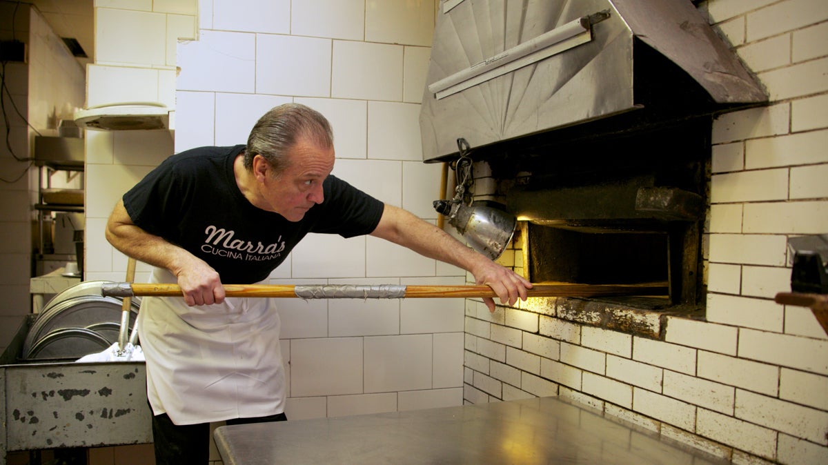 Head chef Robert D’Adamo works the oven at Marra's in South Philadelphia (Nathaniel Hamilton/for NewsWorks) 