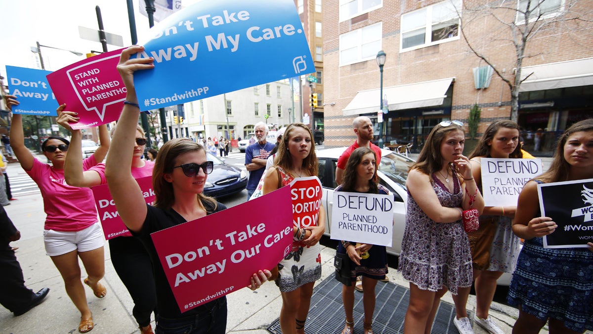 Opponents and supporters of Planned Parenthood are shown demonstrating in Philadelphia in 2015. (AP Photo/Matt Rourke)