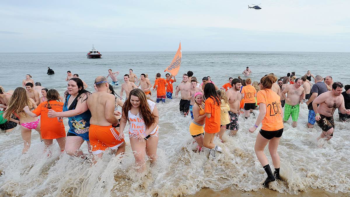 'Freezin For A Region' was the motto of the 24th Annual Lewes Polar Bear Plunge for Special Olympics held in Rehoboth Beach on Sunday. Feb. 1.  More than 3,000 'bears' made the jump into the frigid Atlantic Ocean. The Annual event is the major fundraiser of Delaware Special Olympics. (Chuck Snyder/ for NewsWorks) 