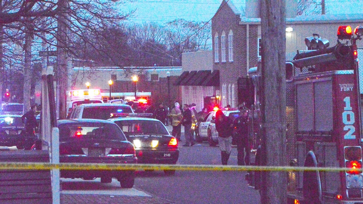  Investigators work at the scene of the Wilmington Police shooting Thursday.(John Jankowski/for NewsWorkrs) 