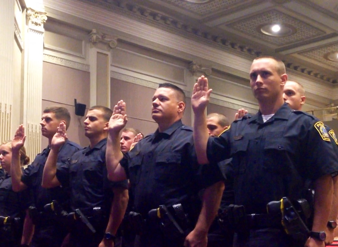  The Lexington Police Department swearing in new officers in July 2014. (Josh James/WUKY) 