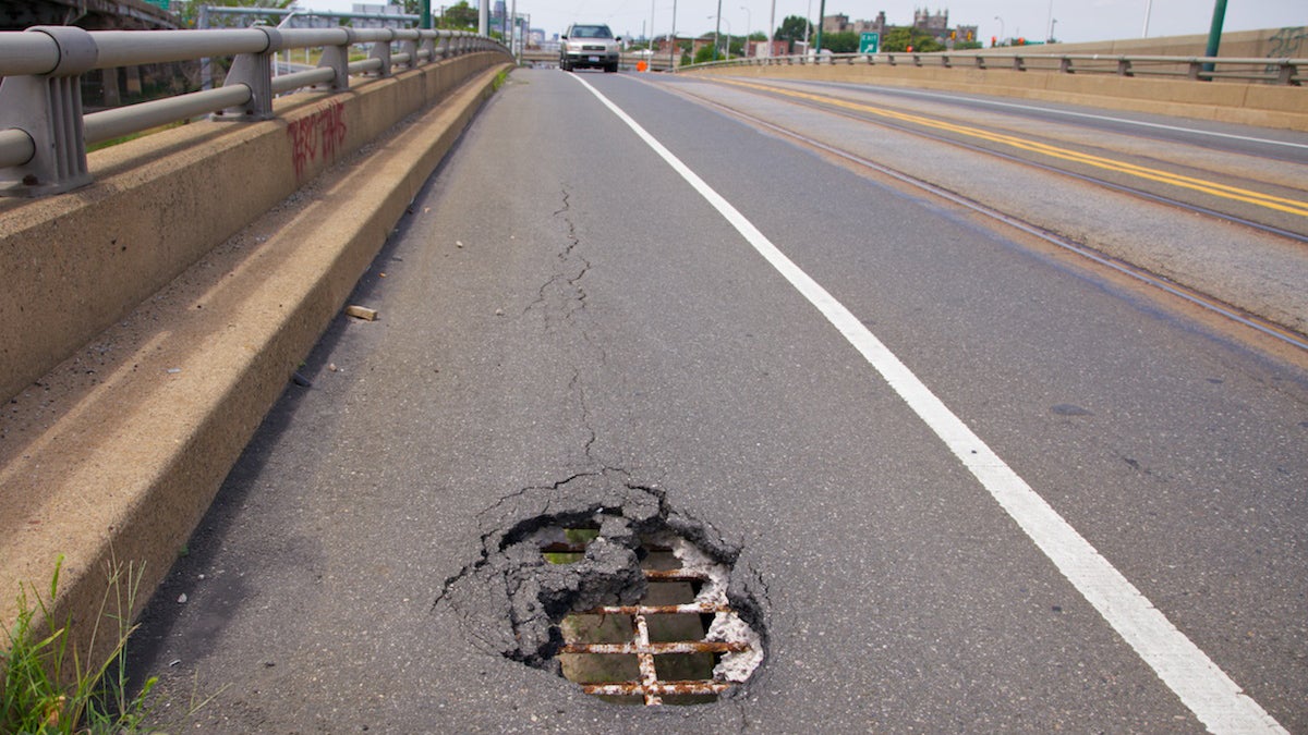  A pot hole is shown in an East Girard Avenue overpass in Philadelphia. (Nathaniel Hamilton/for NewsWorks, file) 