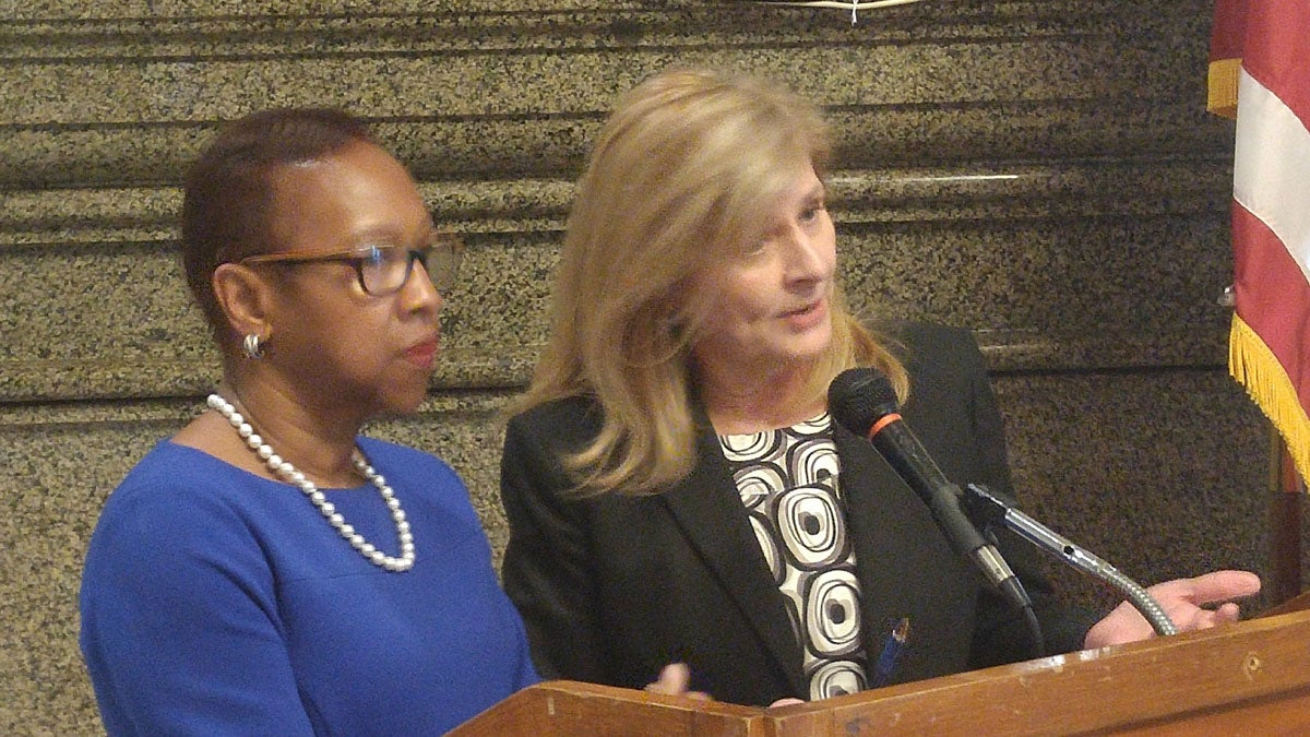 Loretta Sweet Jemmott (left) and Sharon Easterling discuss the final report on Philadelphia's plan for citywide pre-K. (Tom MacDonald/WHYY)