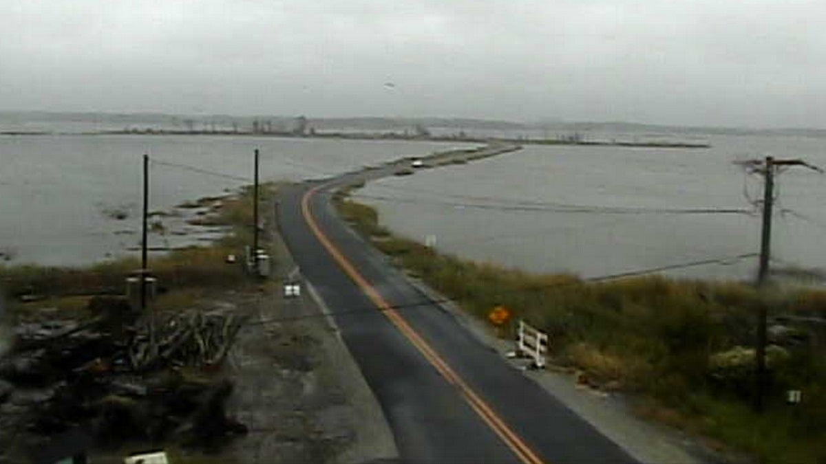  The view of Prime Hook Road from DelDOT's traffic camera shows encroaching water starting to cover the roadway. 