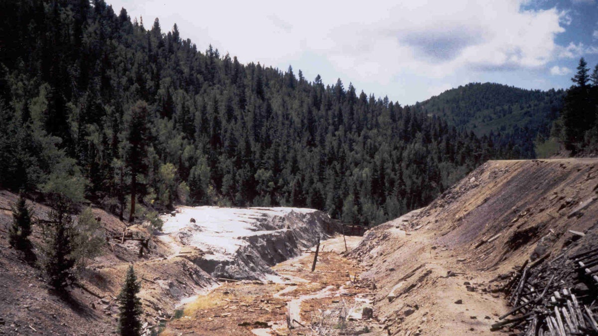 Mine tailings and water laden with heavy metals spilled out below the Rawley12 mine tunnel on the Rio Grand National Forest