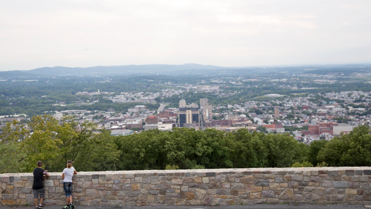  Two teenagers take in the view of Reading, Pa. from Mount Penn near the Pagoda.  (Lindsay Lazarski/WHYY) 