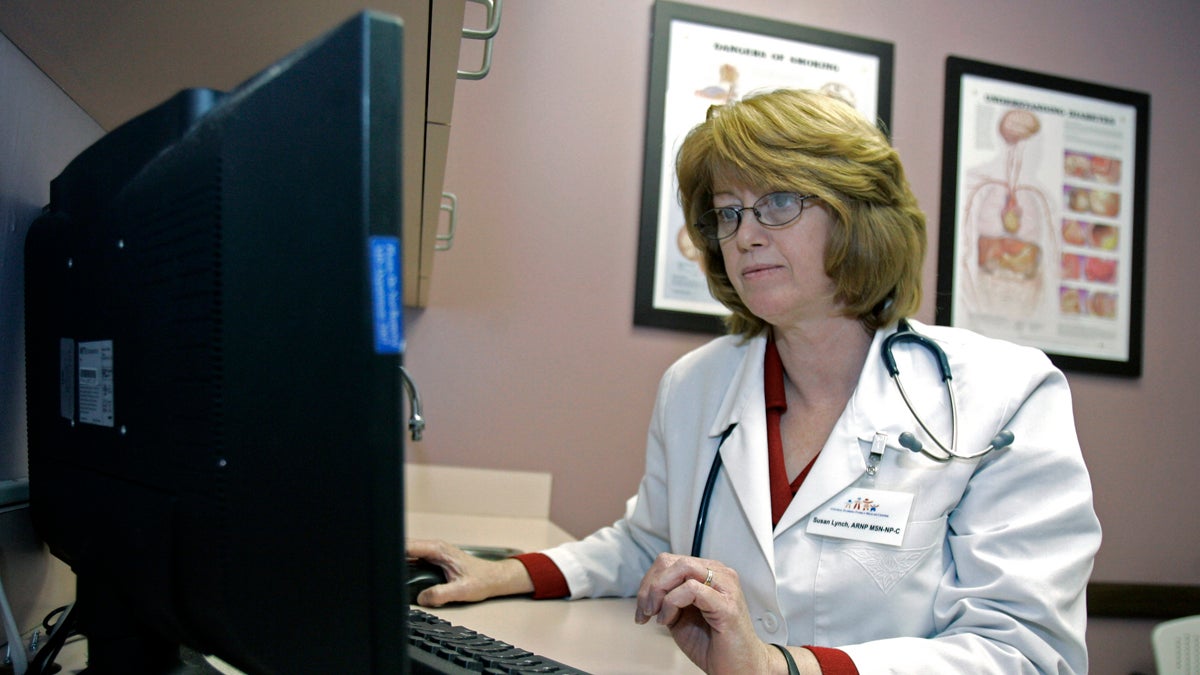  Are computers causing a rift between patients and providers? (John Raoux/AP) 