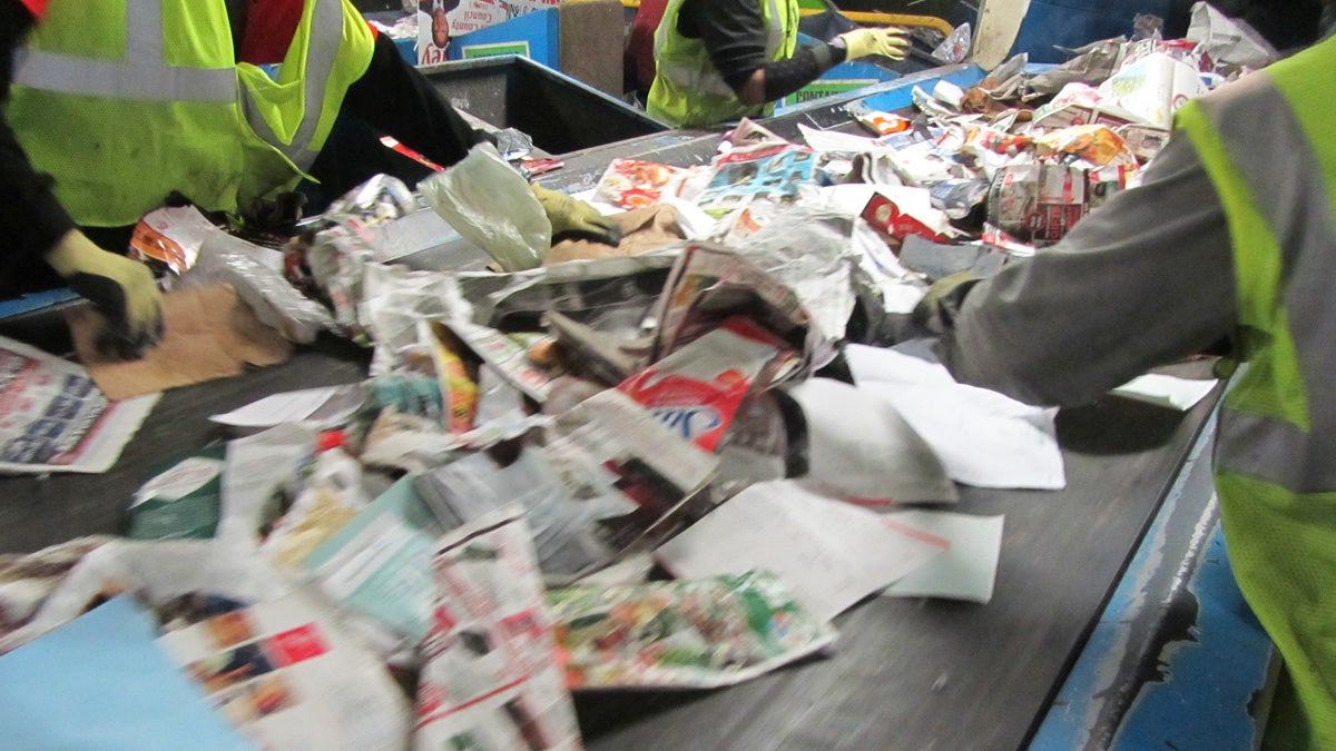 Sorting through recycling  (John Mussoni/WHYY) 