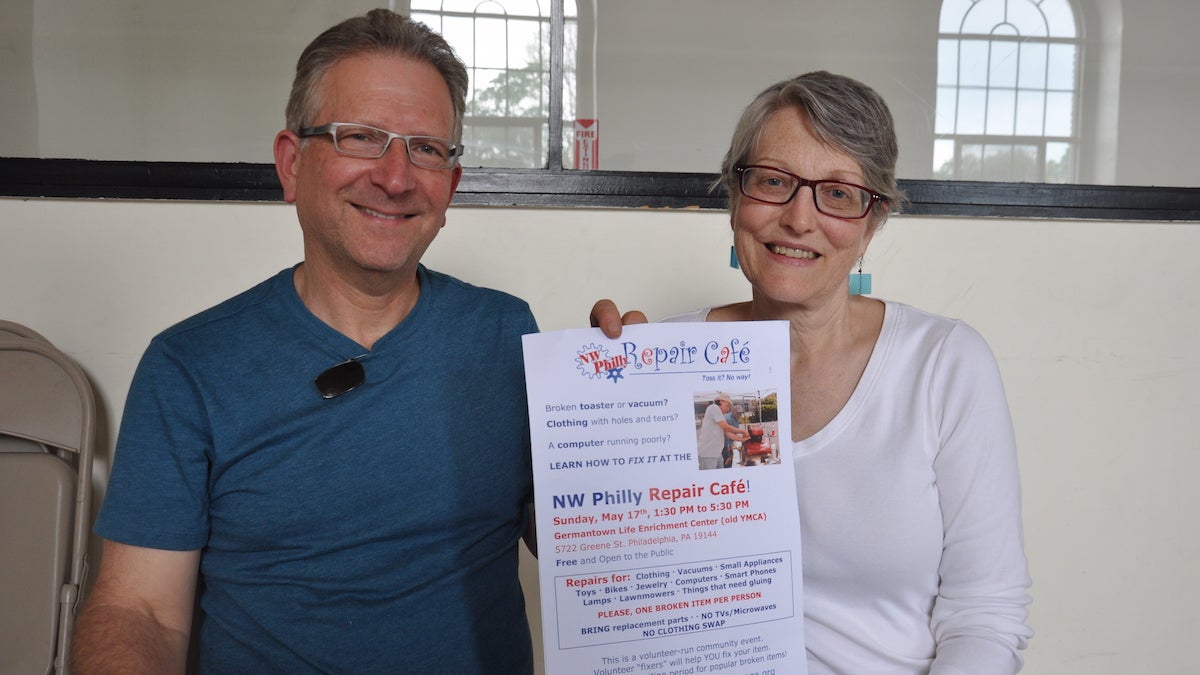  Mark Klempener (left) is a coordinator of Time4Time Community Exchange and Betsy Wallace (right) is the co-founder of the group. Both have been canvassing Northwest Philly to recruit volunteers and encourage neighbors to attend. (Greta Iverson/for NewsWorks) 
