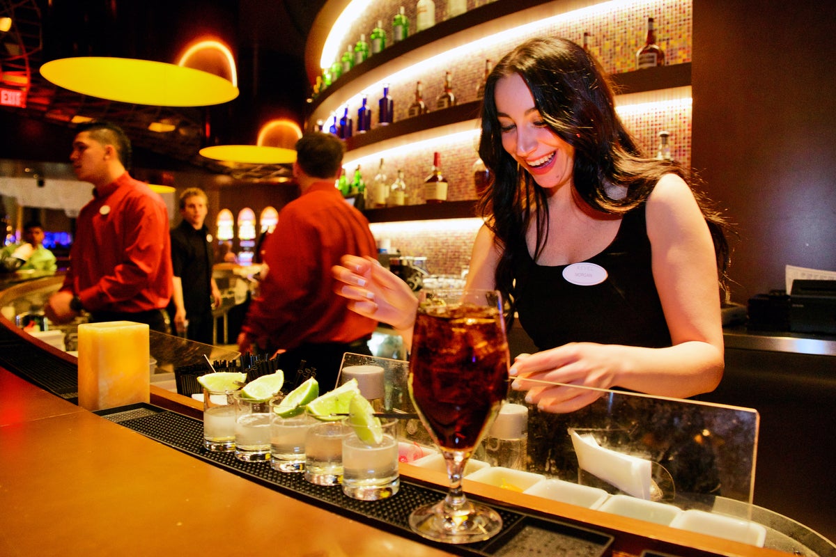  Morgan, a Revel Ultra Lounge bartender prepares drinks. (Bas Slabbers/for NewsWorks 