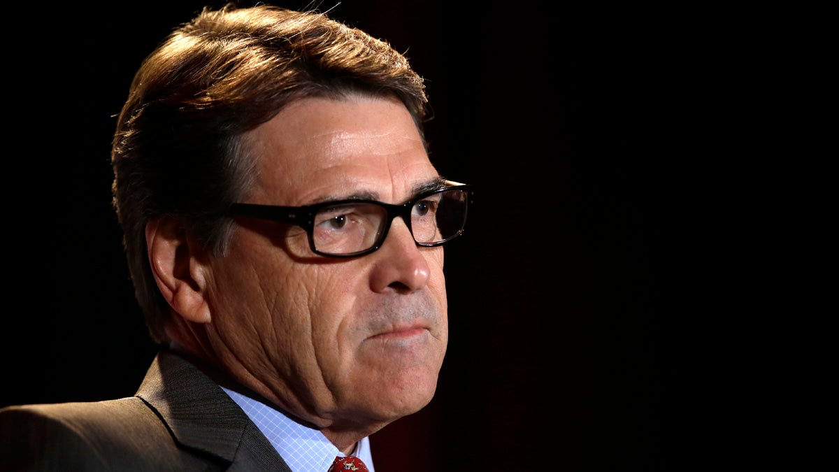  Texas Gov. Rick Perry makes a statement in Austin on Saturday concerning the indictment on charges of coercion of a public servant and abuse of his official capacity. Perry is the first Texas governor since 1917 to be indicted. (AP Photo/Michael Thomas) 