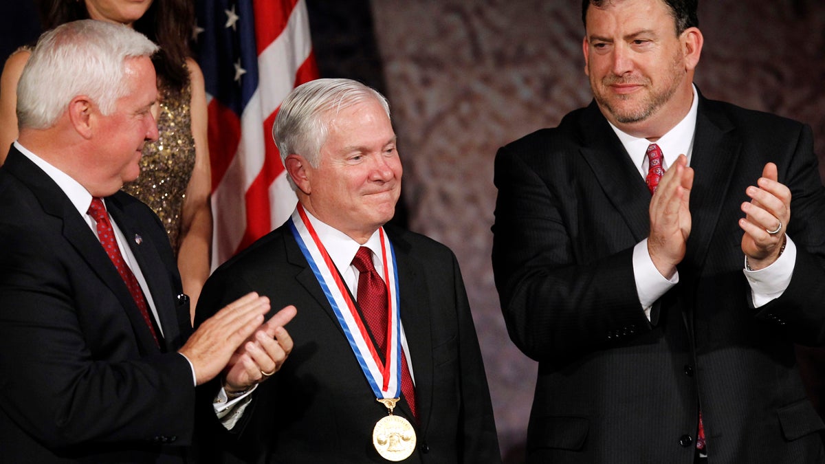 Former Secretary of Defense Robert Gates is shown receiving the Liberty Medal during a ceremony at the National Constitution Center in Philadelphia in 2011. (AP Photo/Alex Brandon