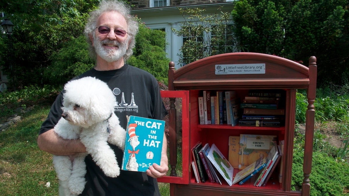  Ron Kanter set up a Little Free Library book share on his lawn to give kids easy access to books. (Greta Iverson/for NewsWorks) 