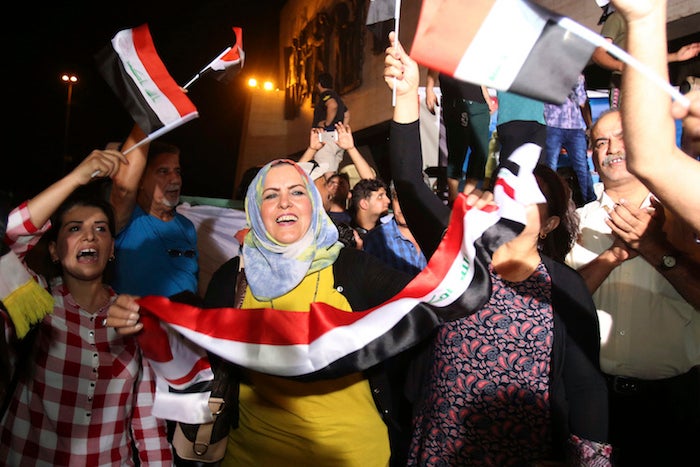 Iraqis celebrate in Tahrir square