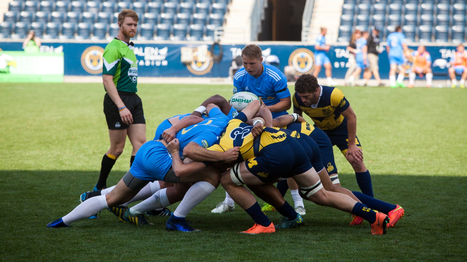 A scrum between University of Michigan and UCLA during this weekends Collegiate Rugby National Championship at Talen Energry Stadium. (Brad Larrison for NewsWorks)