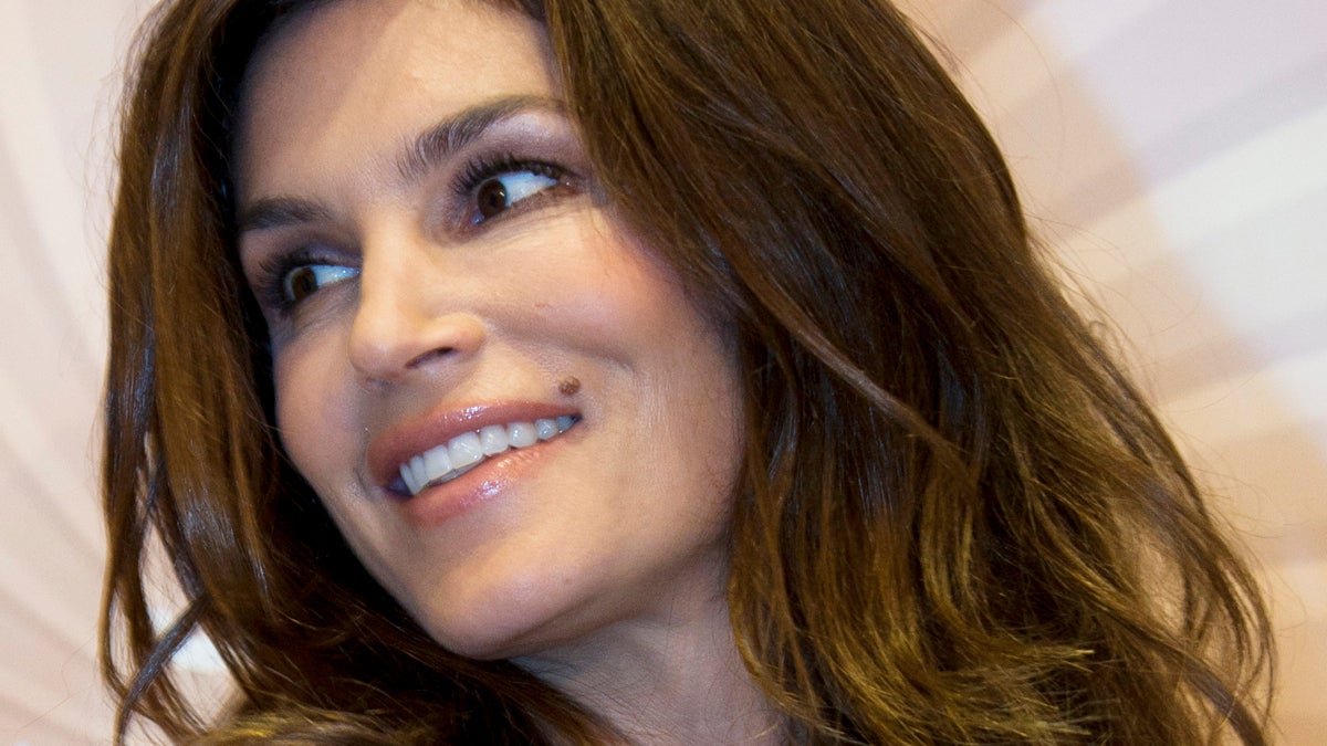  Supermodel Cindy Crawford and her trademark mole. Penn researchers have gained insight into why moles  stop growing and why some turn cancerous. (AP Photo/Alexander Zemlianichenko) 