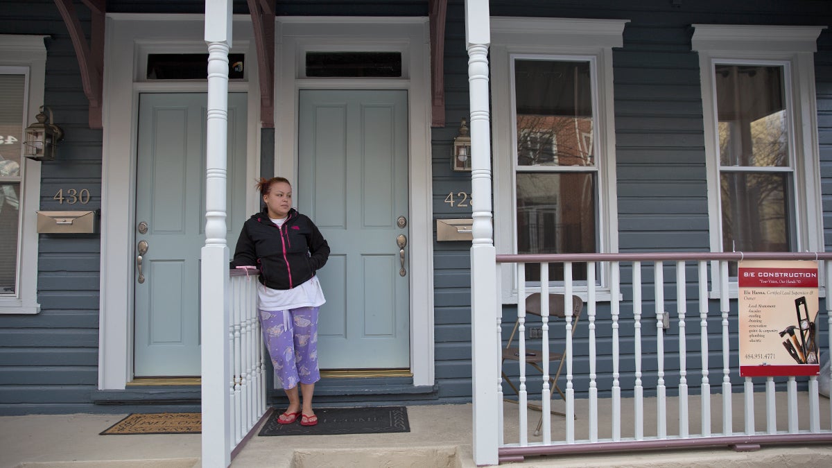 Bethlehem resident Tiffany Gonzalez stands on the front porch of her home on Hayes Street.  Recently