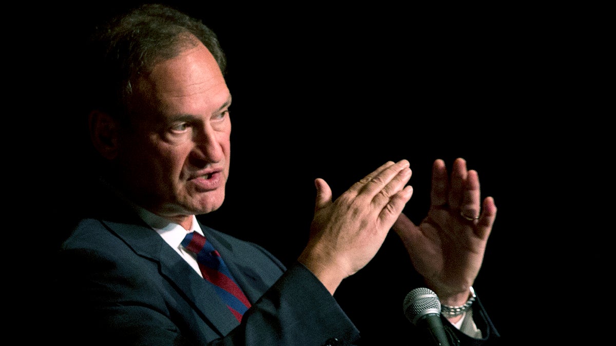  U.S. Supreme Court Justice Samuel Alito, who wrote the majority opinion in the Hobby Lobby decision, is shown speaking in in Florida in February. During the speech, Alito said that the nine justices would undermine the court's standing if they were concerned about public opinion. (AP Photo/Wilfredo Lee, file) 