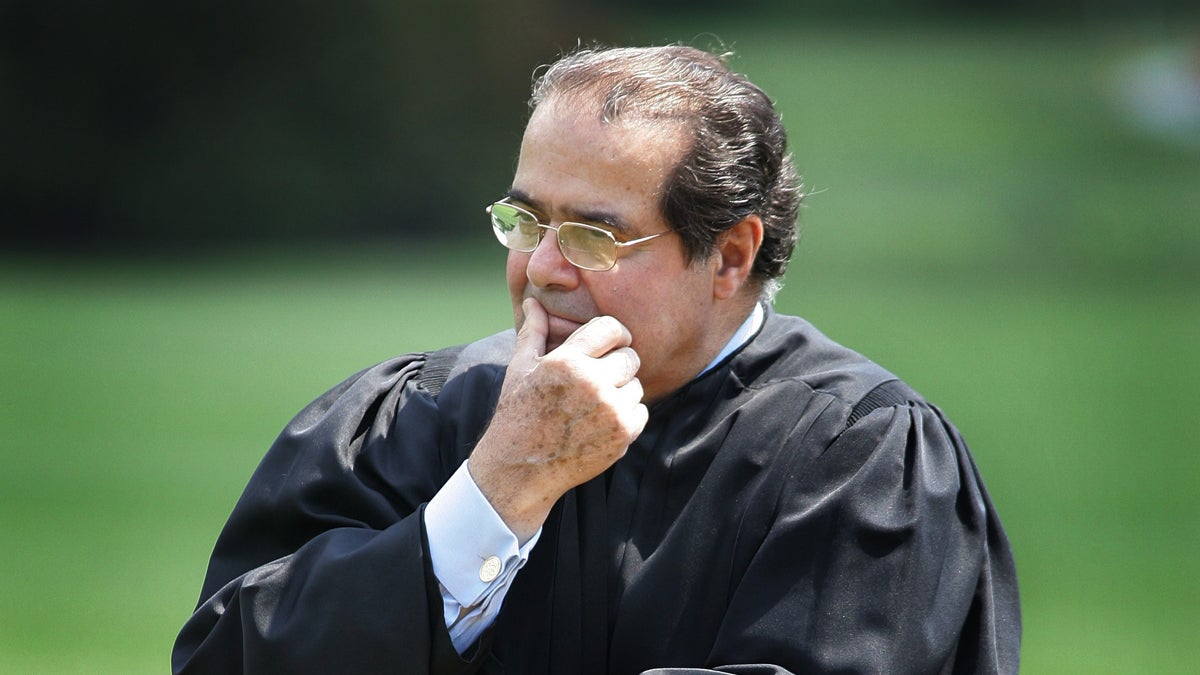  Supreme Court Justice Antonin Scalia is shown in this 2006 file photo listening to President Bush speak on the South Lawn at the White House in Washington. Scalia has died at the age of 79. (AP Photo/Ron Edmonds, File) 
