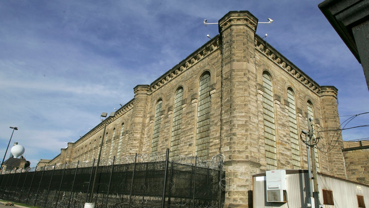 Fences and razor wire are seen around the yards behind the former State Correctional Institution in Pittsburgh. (AP File Photo/Keith Srakocic)