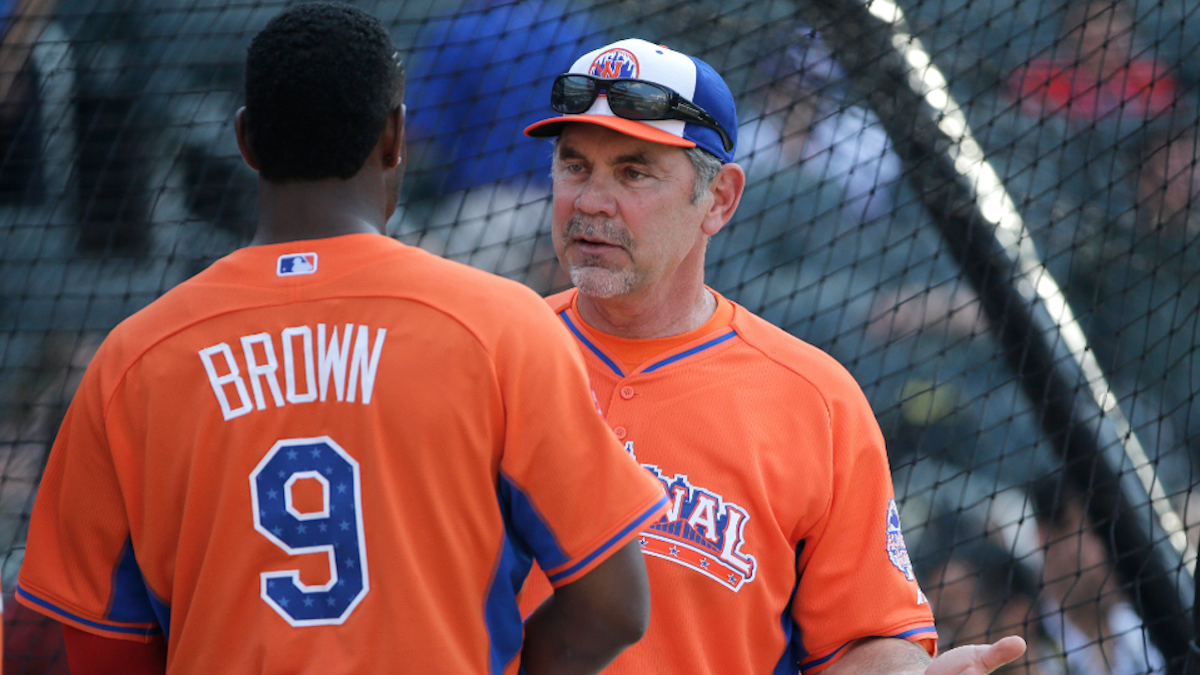 National League manager Bruce Bochy of the San Francisco Giants talks with Domonic Brown during batting practice for the MLB All-Star baseball game. (AP Photo/Matt Slocum)