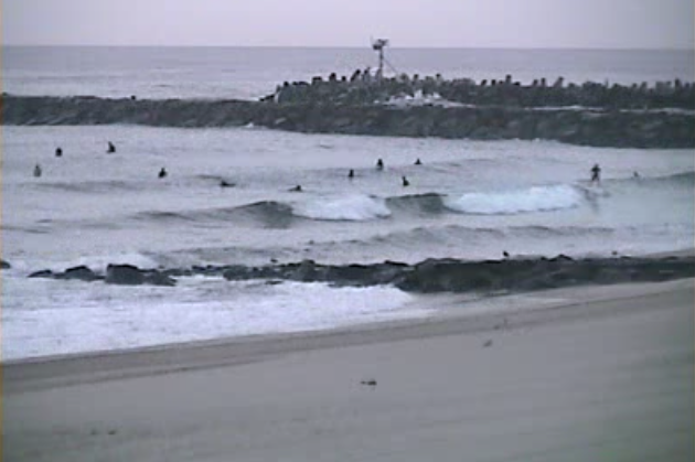  Surfers at the Manasquan Inlet. (Image: TheSurfersView.com) 