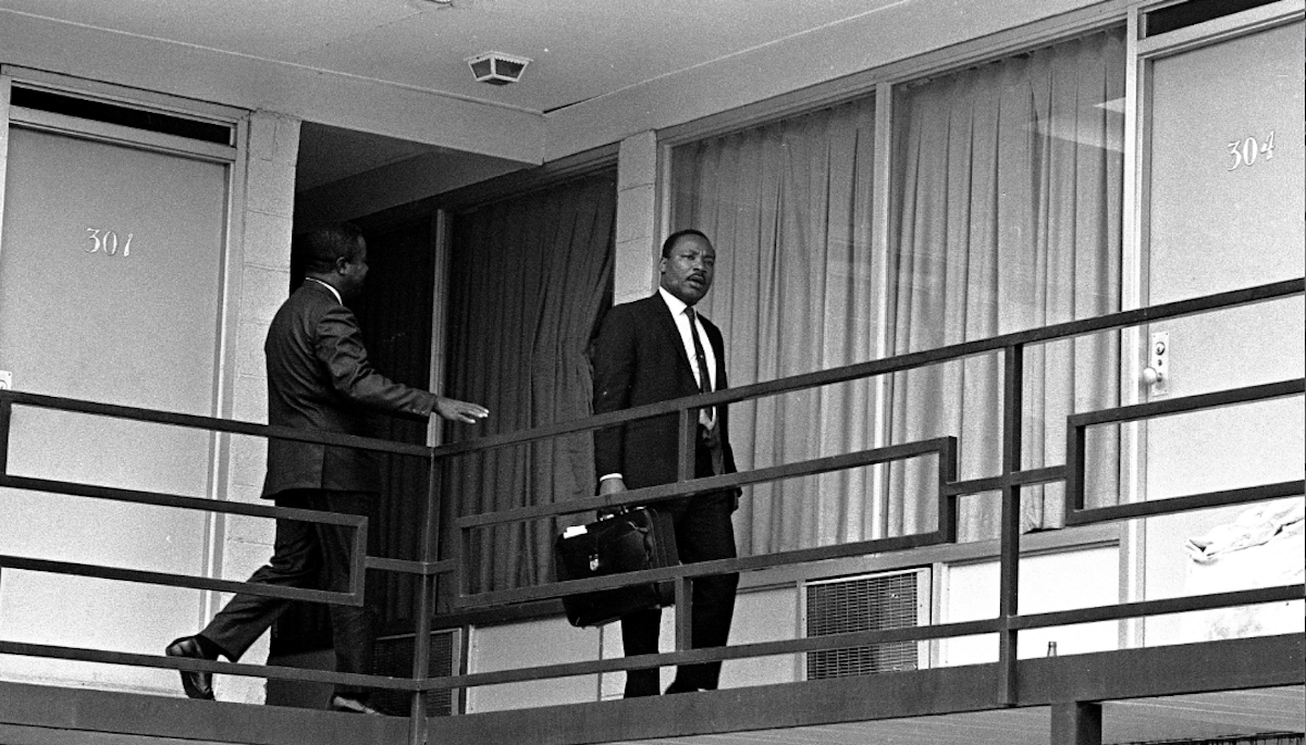  Rev. Martin Luther King, Jr. is pictured walking across the balcony of the Lorraine Motel in Memphis, Tenn. at approximately the spot where he was shot by a hidden assassin. This picture was made, April 3, 1968, the day before the shooting, shortly after King arrived in Memphis. (AP Photo/stf) 