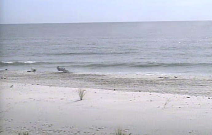  A lone fisherman in Beach Haven at about 10:20 a.m. today. (Image: TheSurfersView.com) 