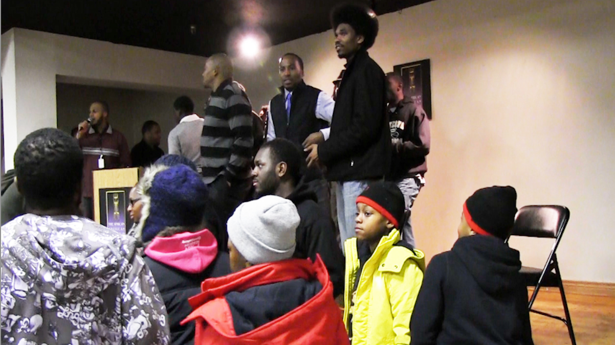  Tyree Dumas (bottom row center) with young men from his program, The Dollar Boyz. (Solomon Jones/for NewsWorks) 