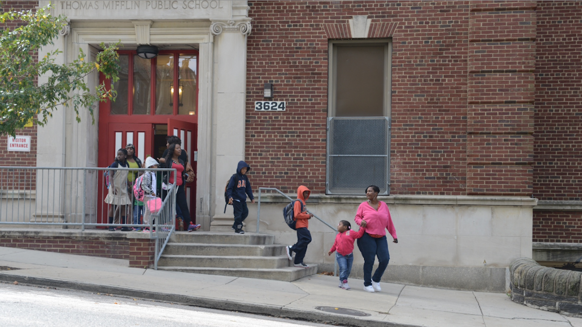  Students are led away from Thomas Mifflin Elementary School on Tuesday after a pre-K student was found with what is believed to be crack cocaine in his pockets. (Bas Slabbers/for NewsWorks) 