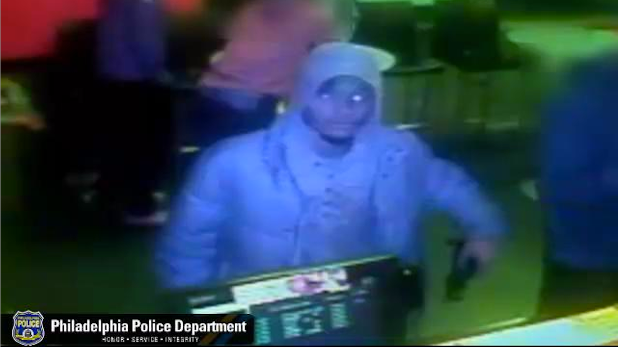  Surveillance footage of a gunman who fled a West Oak Lane Pizza Hut after seeing the cash register was empty. (Courtesy of Philadelphia Police) 