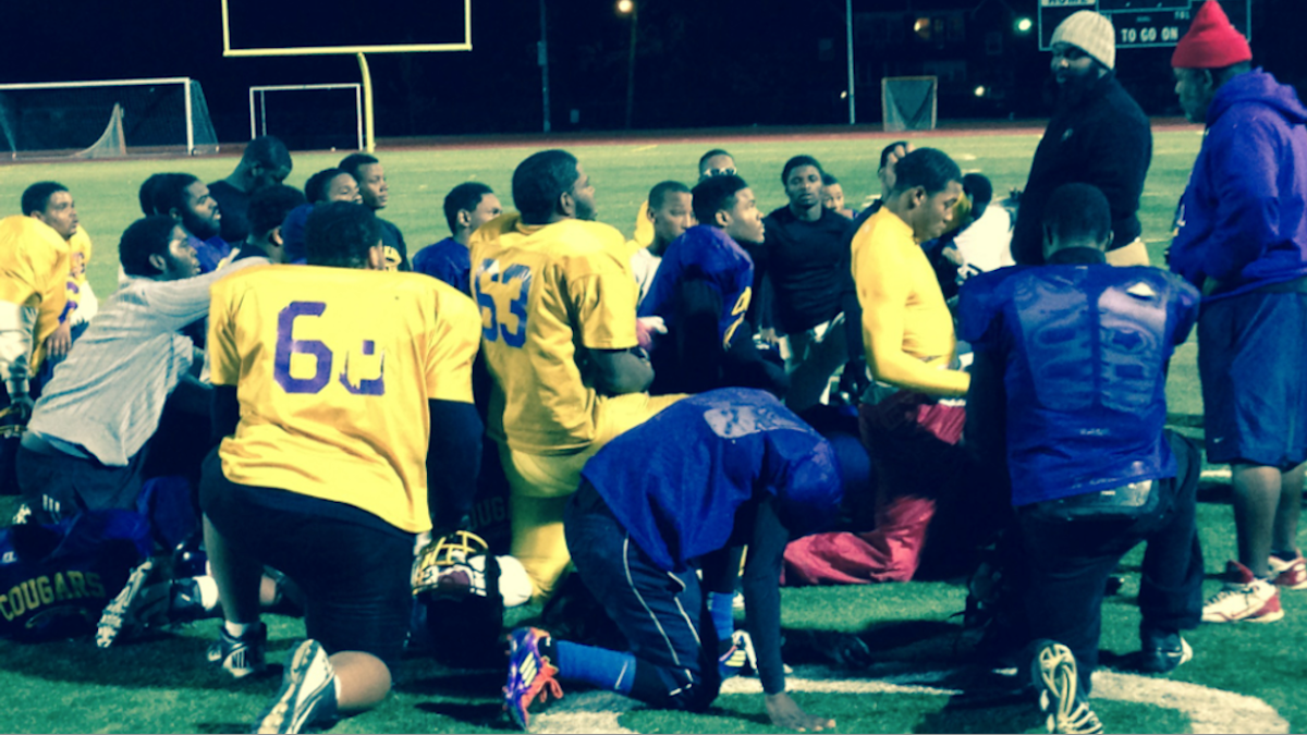  The MLK Cougars, seen here at the end of Thursday's practice, will face the Imhotep Panthers on Thanksgiving at Benjamin Johnston Stadium. (Brian Hickey/WHYY) 