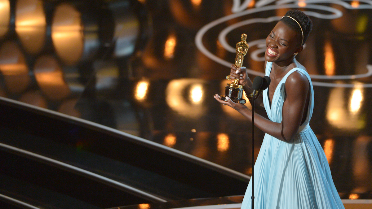   Lupita Nyong’o accepts the award for best actress in a supporting role for 