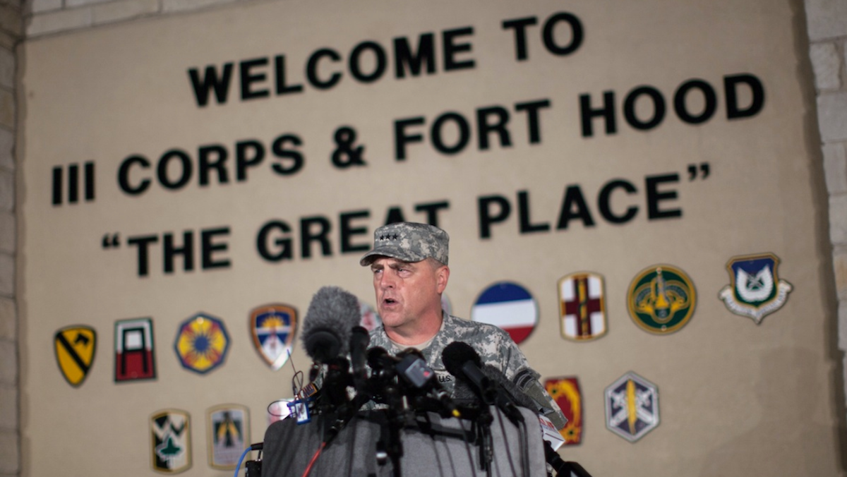  Lt. Gen. Mark Milley, commanding general of III Corps and Fort Hood, speaks with the media outside of an entrance to the Fort Hood military base following a shooting that occurred inside, Wednesday, April 2, 2014, in Fort Hood, Texas. Four people were killed, including the gunman, and 16 were wounded in the attack, authorities said. (AP Photo/Tamir Kalifa) 