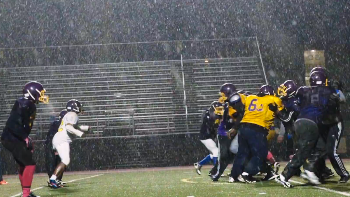  The MLK High Cougars football team practicing in the snow. (Image from the 'We Could Be King' Trailer) 