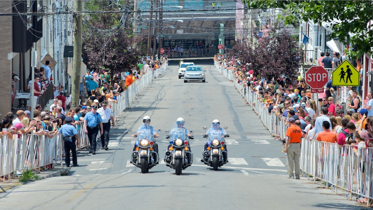  Police made their presence known at the 2011 bike race in Manayunk. Reports of rowdiness have dwindled in subsequent years. (Bas Slabbers/for NewsWorks) 
