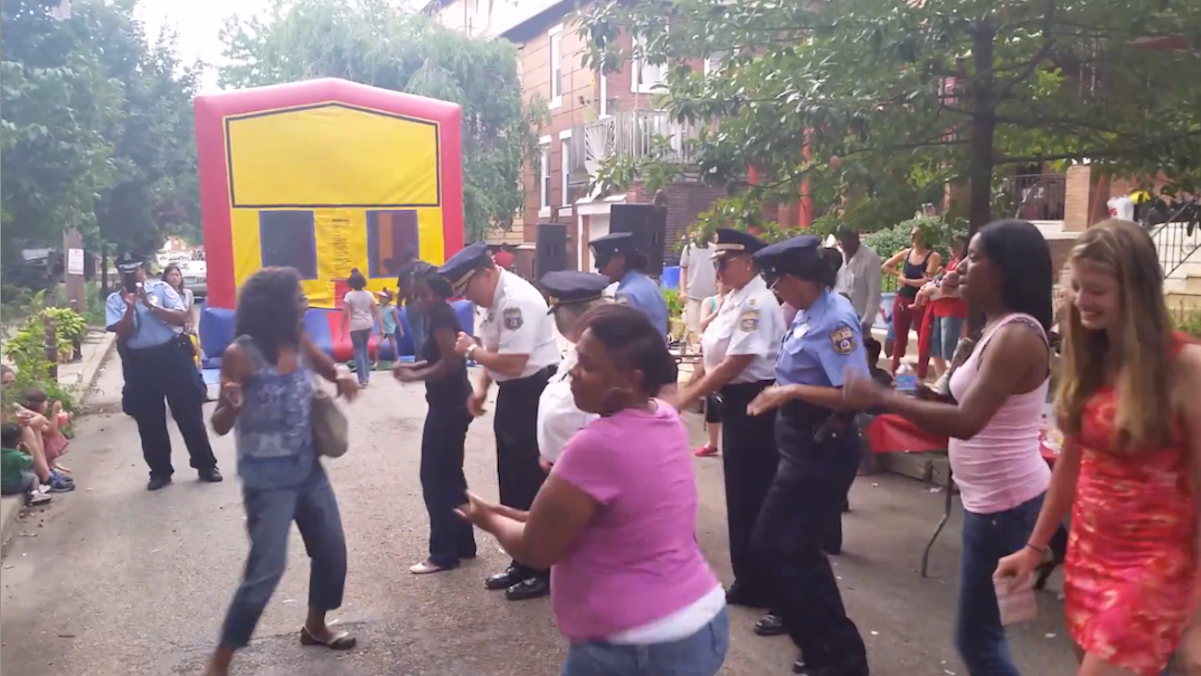  At one of numerous National Night Out events across the city, police and residents got their groove on in West Philly on Tuesday night. (Photo courtesy of Philadelphia Police) 